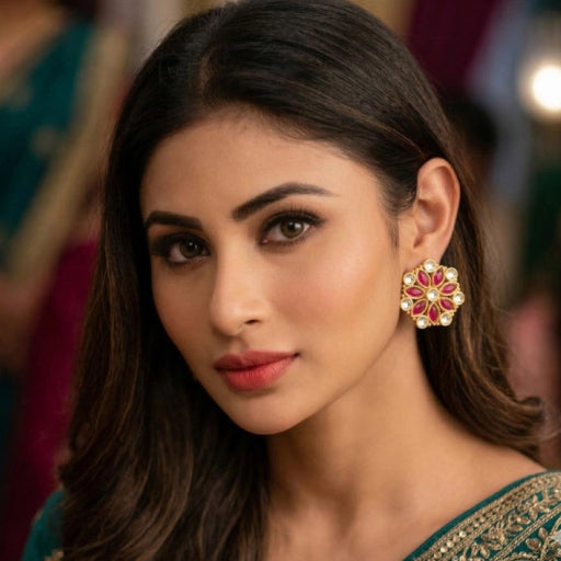 Woman wearing a floral earring with a blurred background