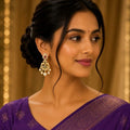 Gold Chandbali Earrings with Emerald Green Crystal Drops